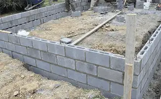 Professionals building a foundation with blocks in New Orleans, LA